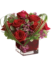 Composizione con rose rosse